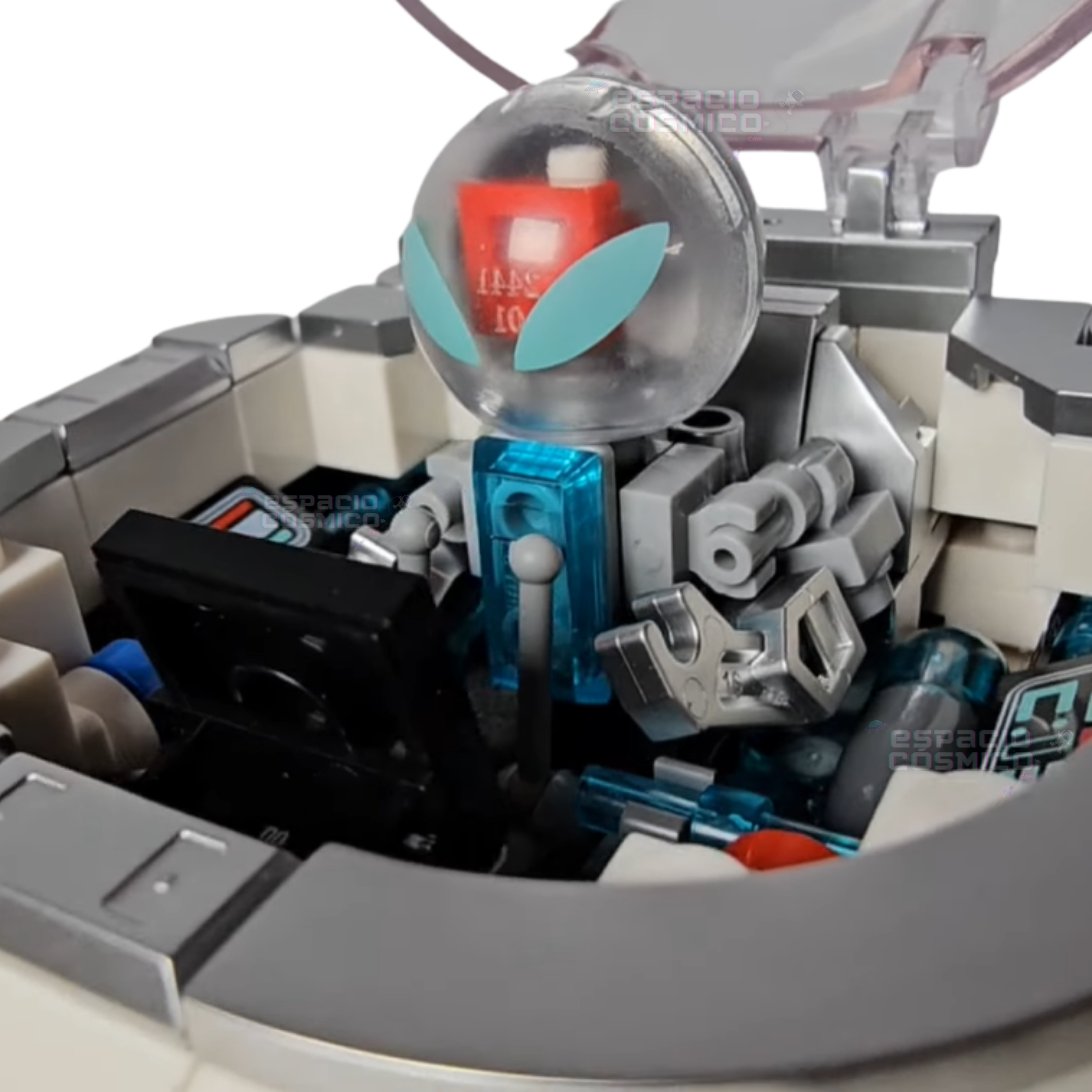 Close-up of the alien figure inside the UFO building blocks cockpit